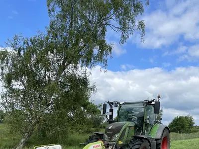Fendt 516 mit Front-Heckkombintion